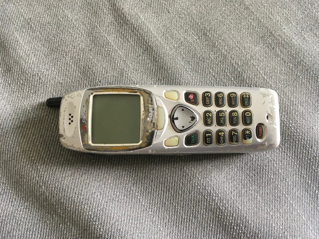 A photo of Faux Jean's first cell phone.