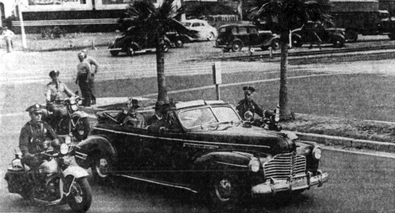 Churchill driving along Biscayne Boulevard in route to Roddy Burdine Stadium on February 26, 1946.