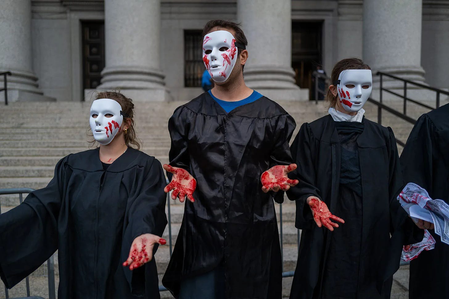 Climate activists participate in a demonstration in front of the Thurgood Marshall U.S. Courthouse against a Supreme Court ruling that curbed the Environmental Protection Agency’s ability to broadly regulate carbon emissions, in New York.