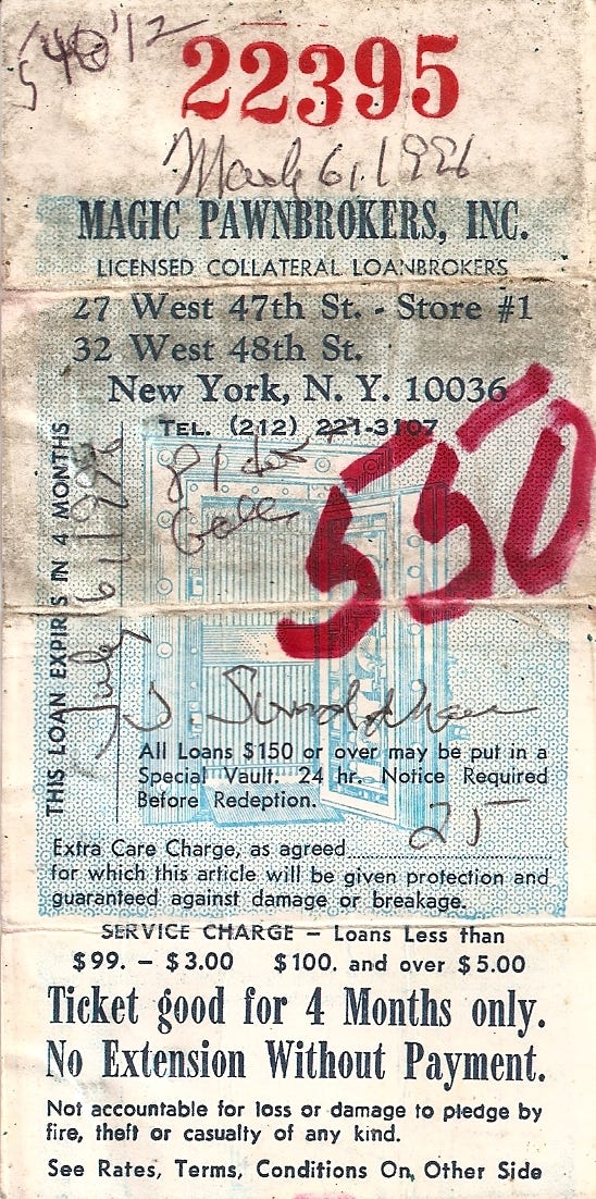 Scanned image of a pawn ticket from Magic Pawnbrokers, Inc, 47th St NYC. There are notations on it in black pen, including my name and the date March 6, 1996, and in bold red marker, the number 550. The ticket is worn, dirty and creased -- as you would expect from a piece of card stock kept in a wallet for more than 10 years.