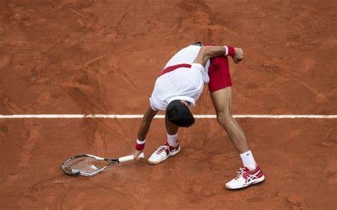 Novak Djokovic breaks racket in frustration during four-hour victory as Elina Svitolina crashes ...