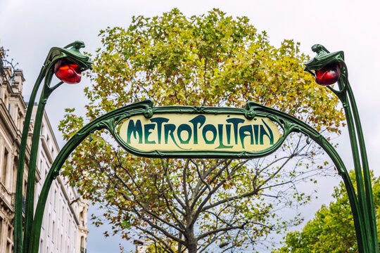 a snapshot of an entrance to the Paris Metro