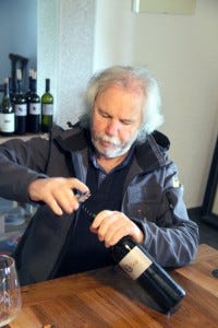 Branko Cotar opens a wine in the tasting room