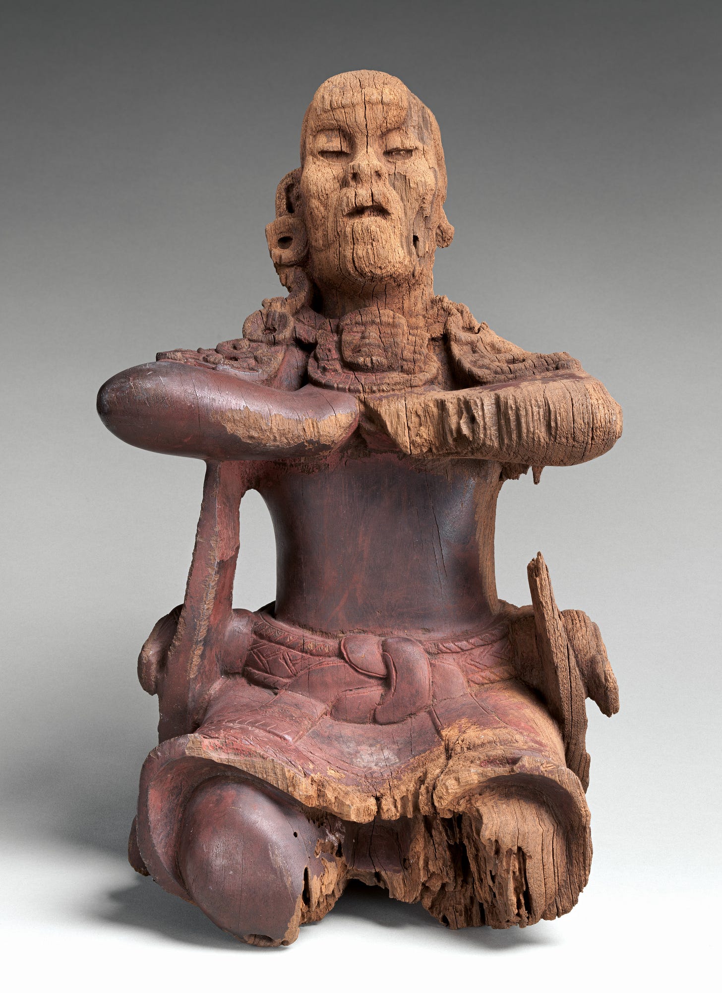 Mirror-bearer, Maya artist(s), Wood (bocote), red hematite, Maya