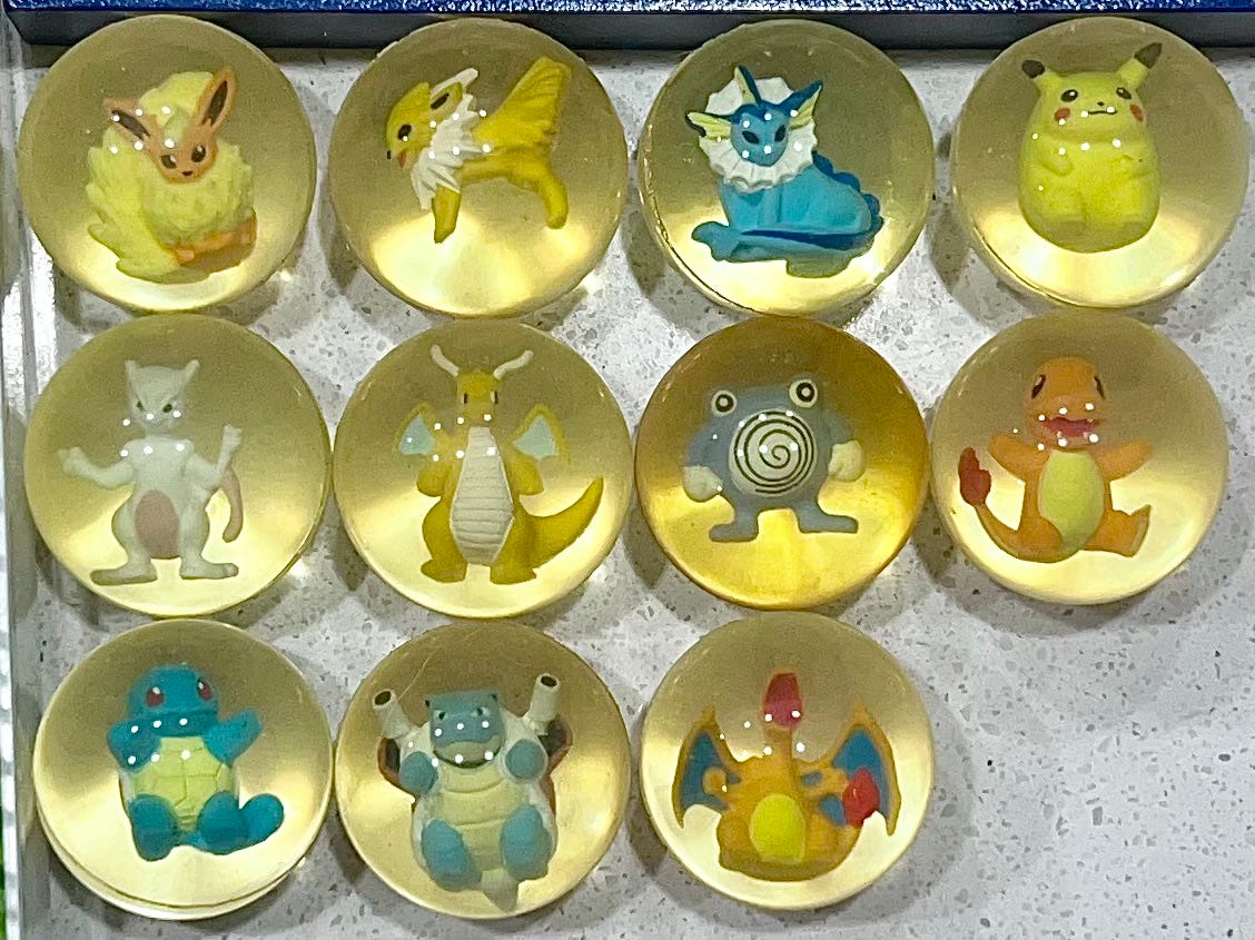 A selection of Pokémon Bouncing Balls that were given away at the Topikachu event (Photo credit: Alyssa Buecker)