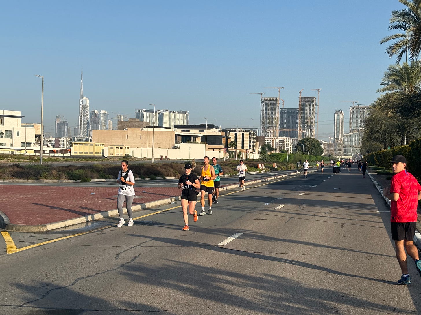 Runners on the Skechers Performance Run in Dubai with the world’s tallest building, the Burj Khalifa, visible in the background