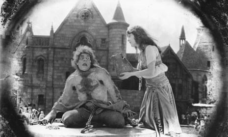 Lon Chaney as Quasimodo chained to a stone wheel and Patsy Ruth Miller as Esmeralda in the 1923 film The Hunchback of Notre Dame. Lon Chaney as Quasimodo chained to a stone wheel and Patsy Ruth Miller as Esmeralda in the 1923 film The Hunchback of Notre Dame.