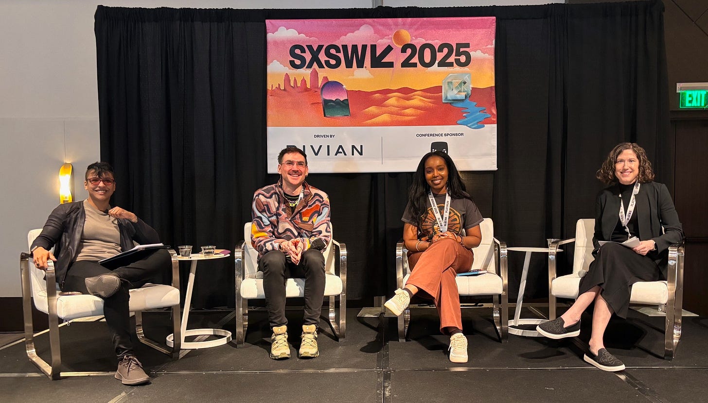 4 cash nerds are seated in white chairs on a stage, smiling for the camera. Behind them is a black curtain and a colorful poster with the branding of South by Southwest.