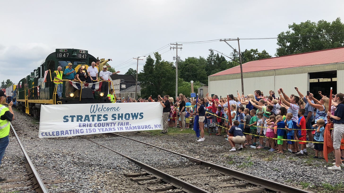 train pulling up to fair in hamburg, ny