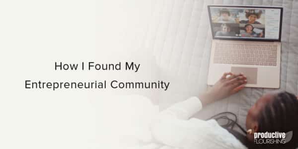 Woman laying on a bed looking at a computer video chat. Text overlay: How I Found My Entrepreneurial Community