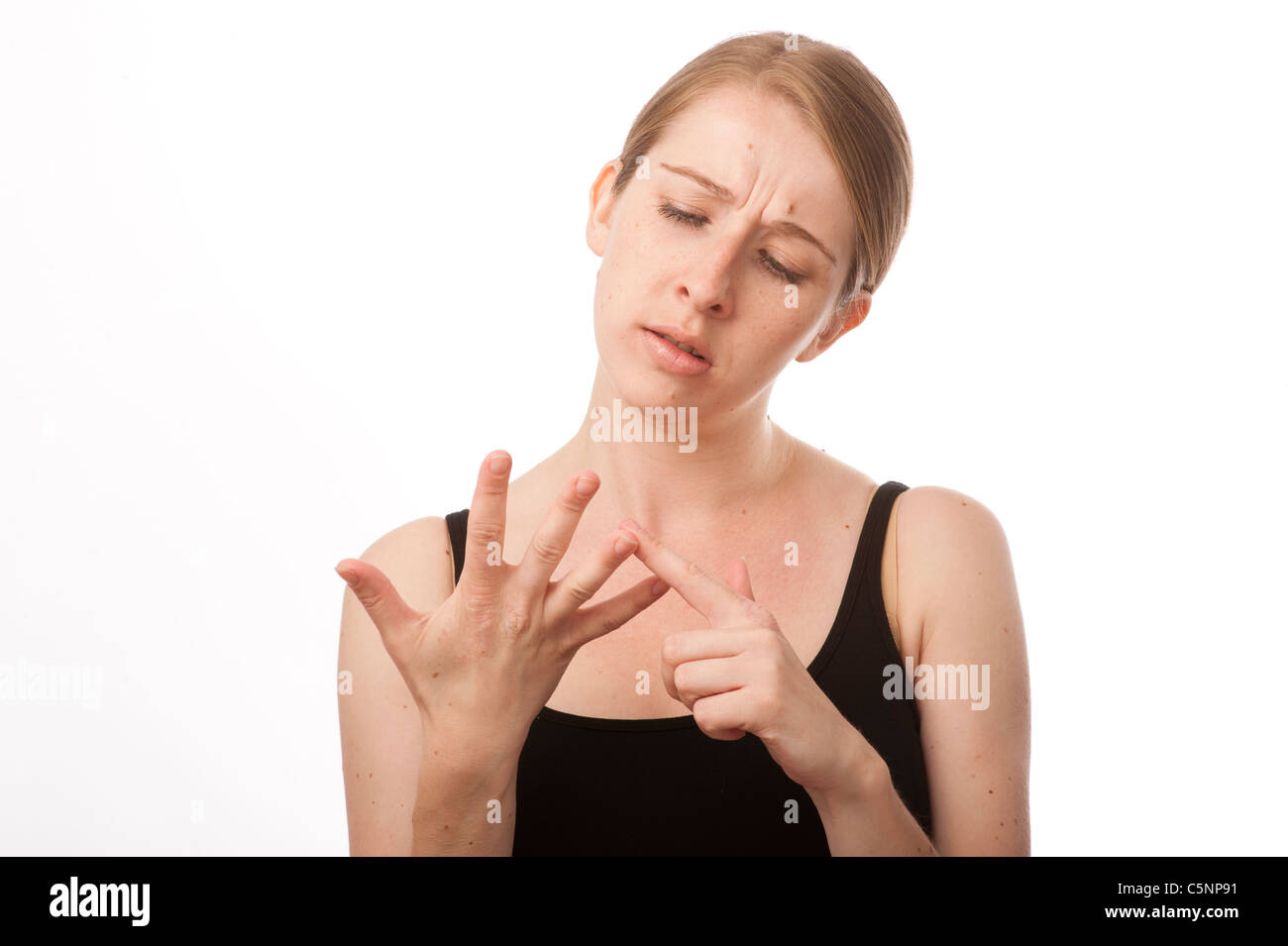 a young caucasian woman counting on the fingers of one hand Stock Photo -  Alamy