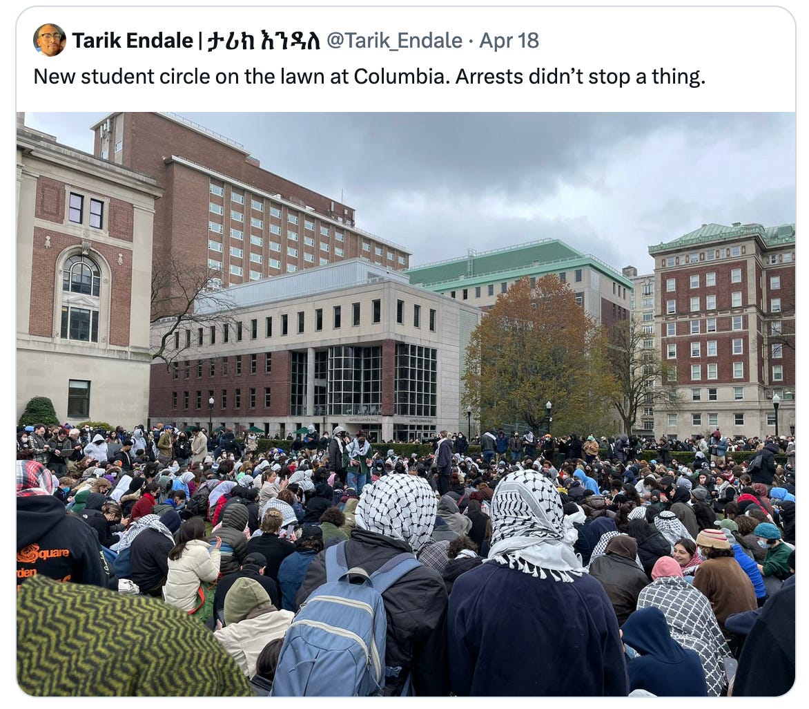 Tarik Endale | ታሪክ እንዳለ Apr 18 @Tarik_Endale New student circle on the lawn at Columbia. Arrests didn’t stop a thing. / hundreds of students, many in kefffiyeh, gathered on the lawn at Columbia University