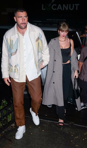 Travis Kelce and Taylor Swift arrive at the "SNL" afterparty on Oct. 15, 2023 in New York City.