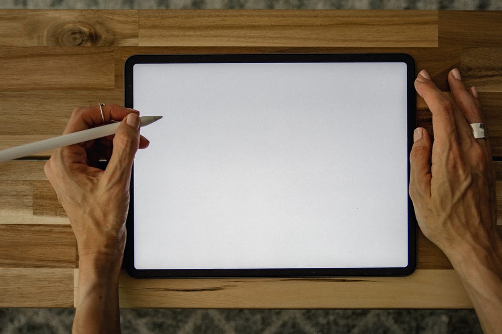 woman about to draw on an ipad