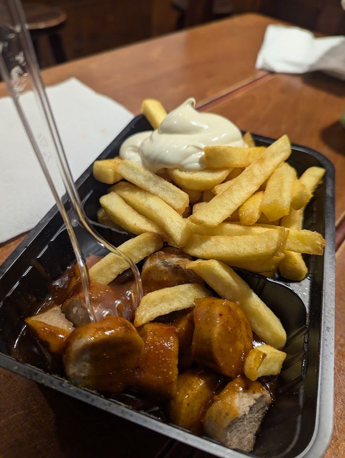 Currywurst: Cut up sausage covered in a curry sauce and masala powder, served with fries and mayonnaise.