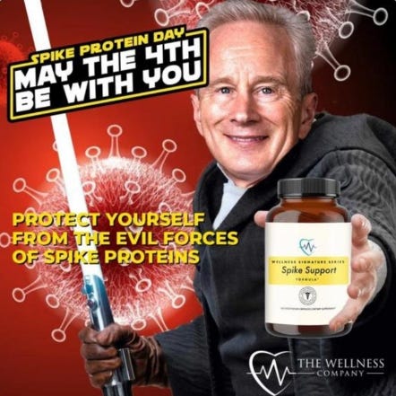 an advertisement for "spike support" by The Wellness Company, using Star Wars imagery to call May 4th "Spike Protein Day: May the 4th Be With You! Protect yourself from the evil forces of spike proteins."