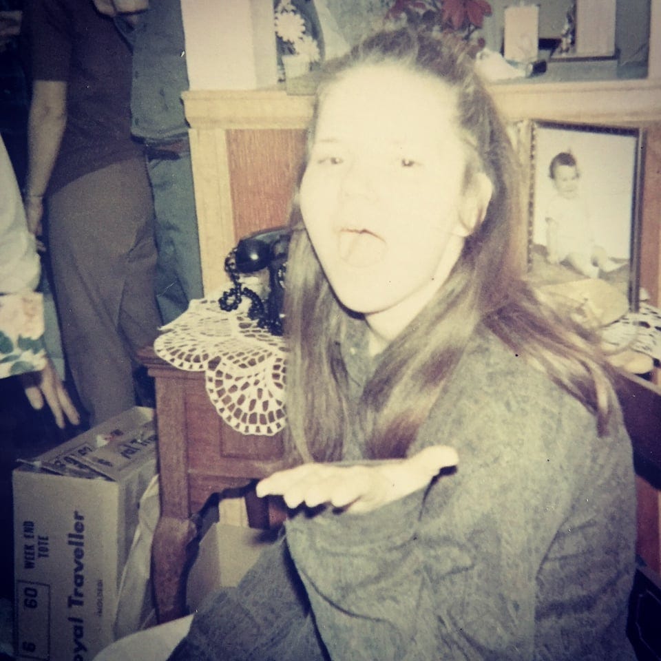 Chris, as a young girl, making a face