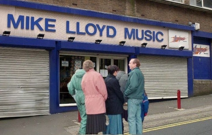 Fans queuing outside Mike Lloyd Music with the shop yet to open Fans queuing outside Mike Lloyd Music with the shop yet to open