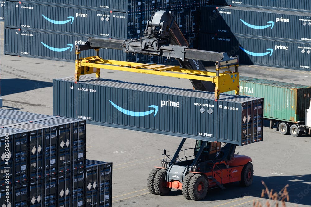 Everett, WA, USA - February 25, 2022; Amazon Prime intermodal shipping  container being stacked by a Linde machine at the Port of Everett with  other branded containers Stock Photo | Adobe Stock