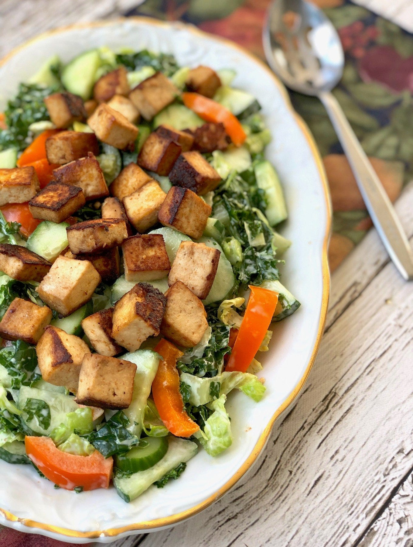 kale and cucumber salad with hot tofu