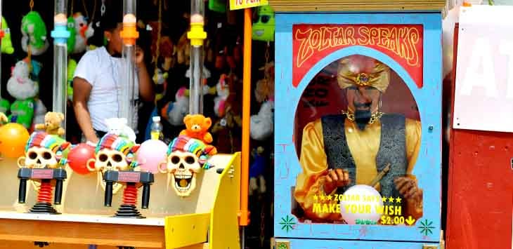 Photo of a fortune-telling machine at a fairground.