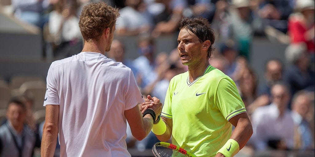 yannick hanfmann giving rafael nadal hand job at french open 2019 images