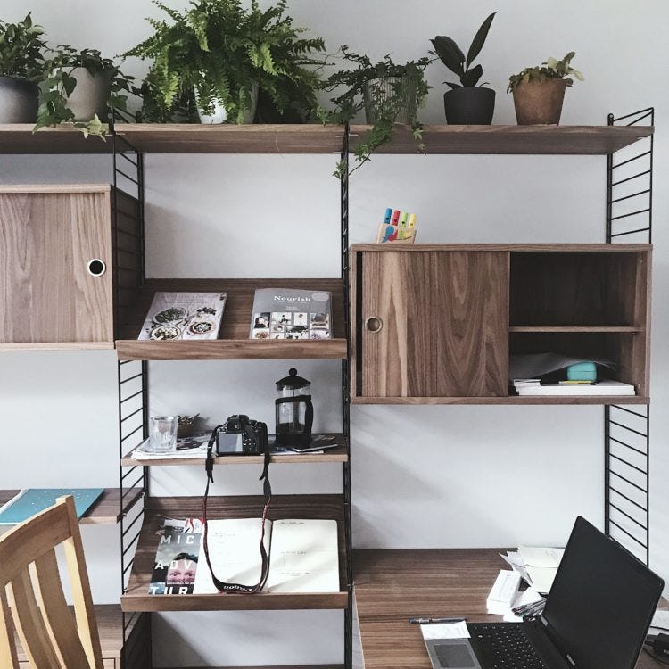 string shelves in the home of Nathalie Aubry