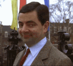 Mr. Bean doing an eyebrow waggle and sauntering off-camera