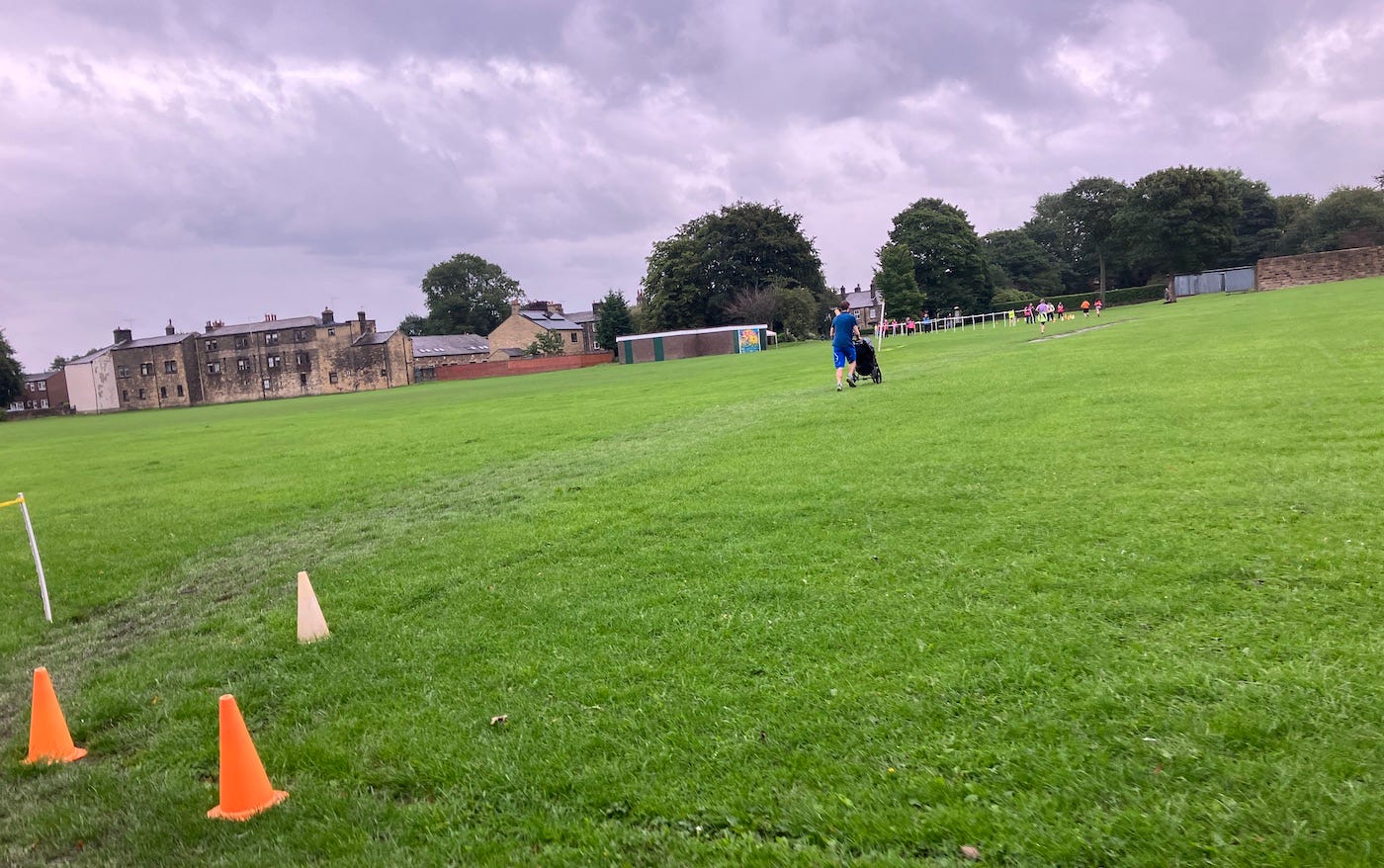 Cones mark a turn in a large field