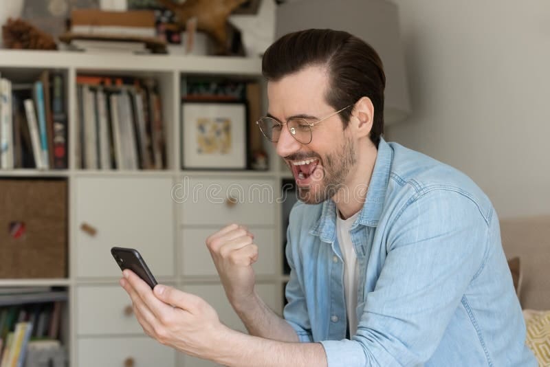 Laughing Man Screaming Yes Reading Good Message from Phone ...
