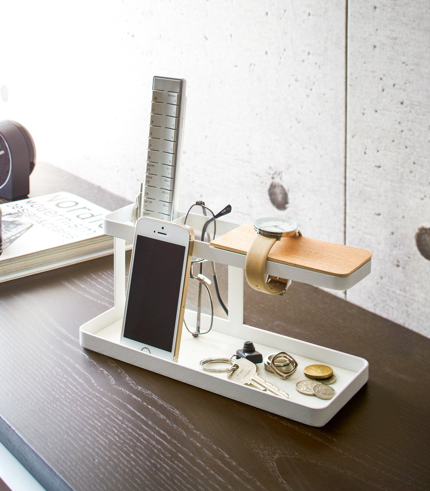 White Desk Organizer holding accessories by Yamazaki Home.