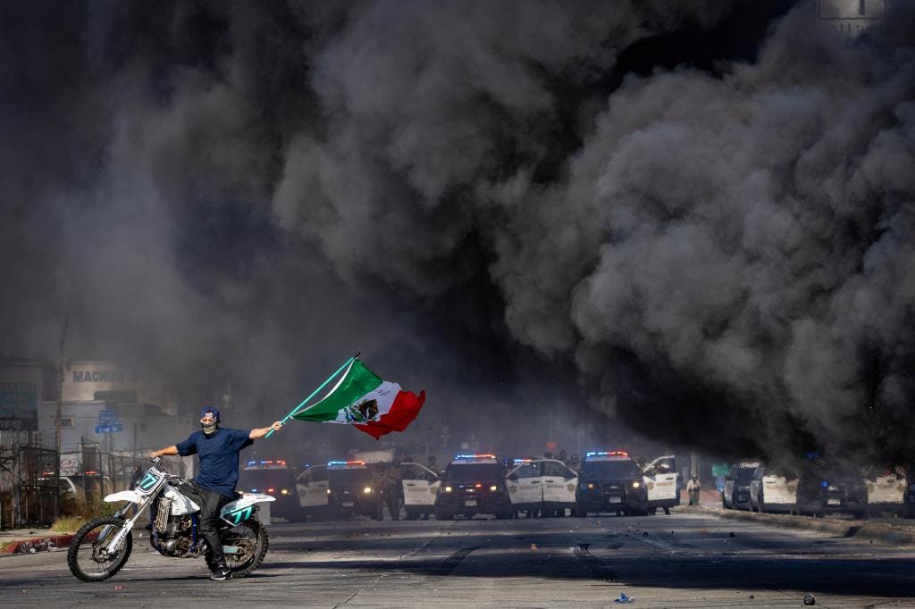 Mexican flag-waving masked protester becomes the symbol of LA anti-ICE riots