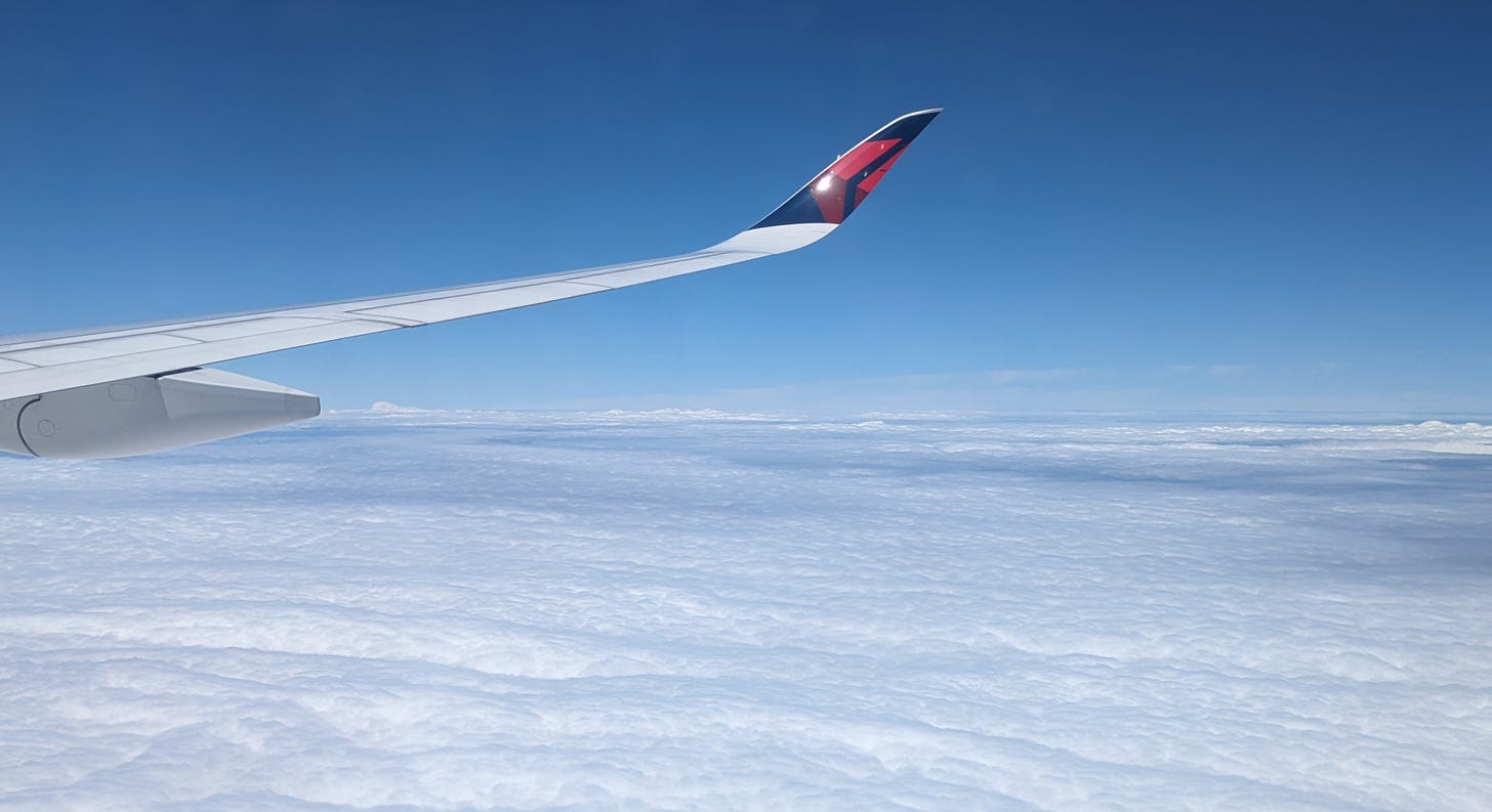 A sea of clouds taken from an airplane.