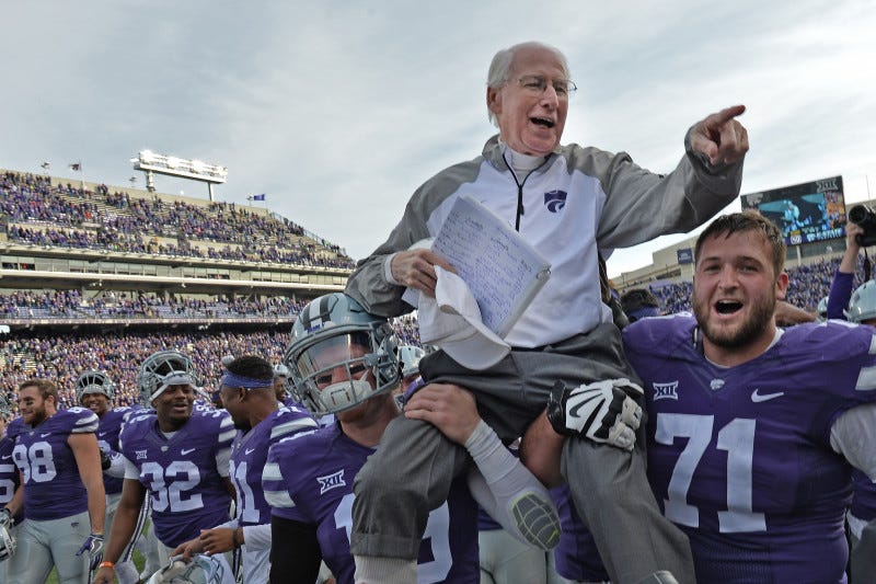 MANHATTAN, KS - NOVEMBER 26:  Head coach Bill Snyder (C) of the Kansas State Wildcats gets carried off the field, after winning his 200th career game against the Kansas Jayhawks on November 26, 2016 at Bill Snyder Family Stadium in Manhattan, Kansas.  (Photo by Peter G. Aiken/Getty Images)