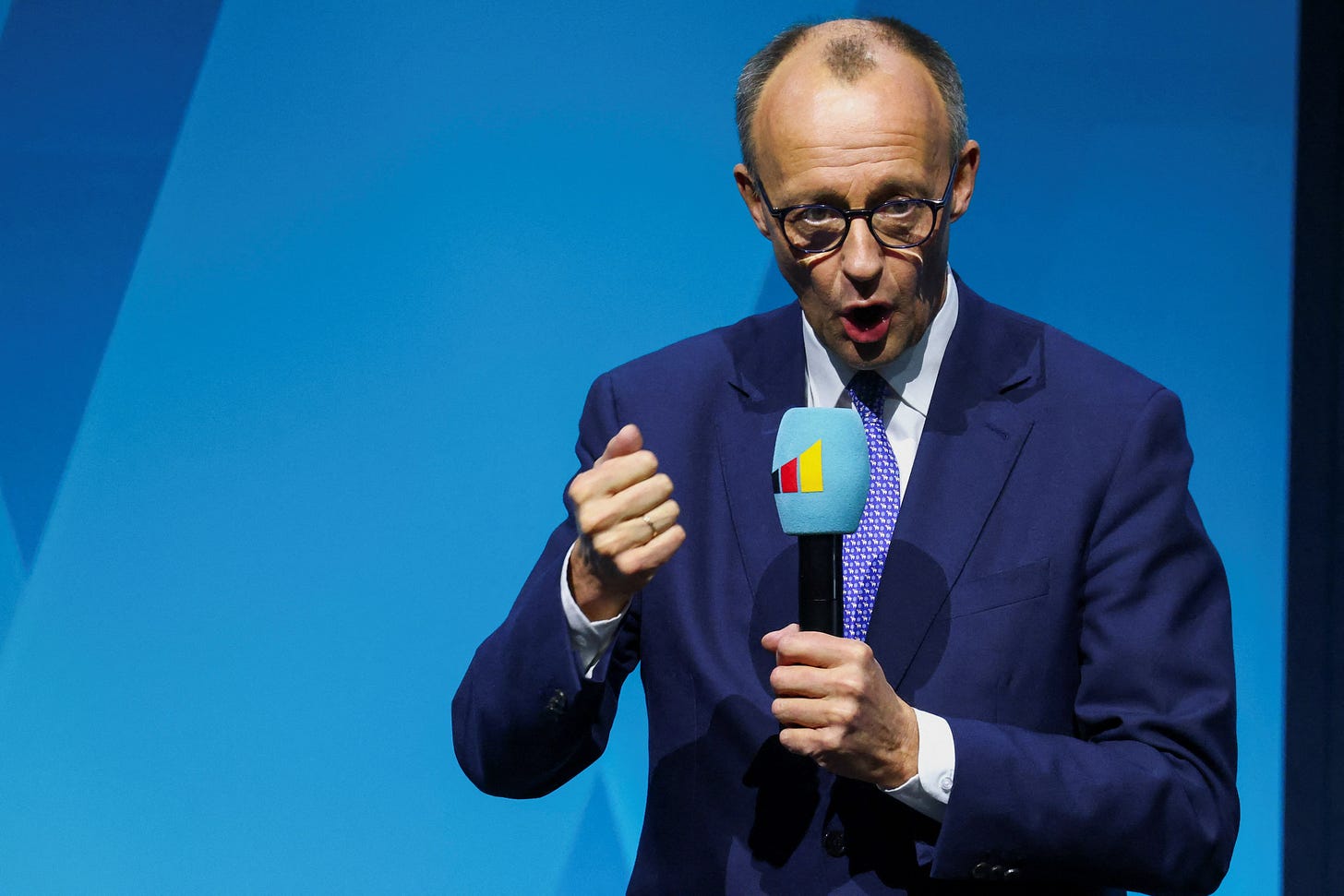 Germany's chancellor frontrunner Merz says US could slide into populist  instability | Reuters