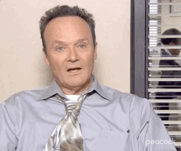 Creed Bratton with black hair, claiming to be 30. 