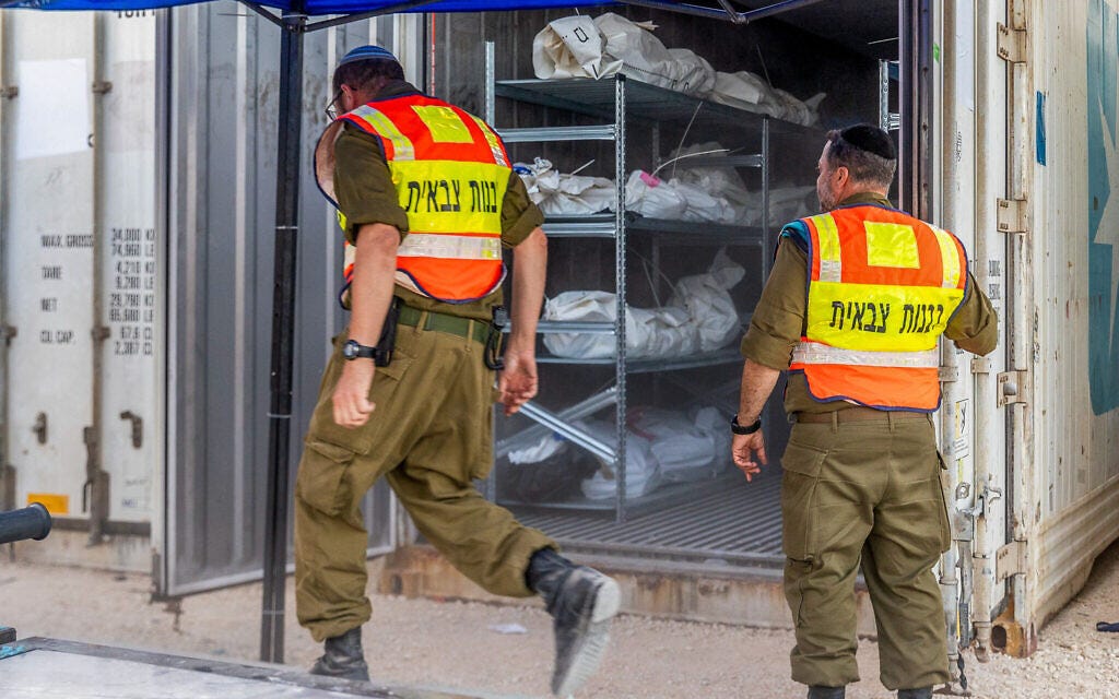 Israeli soldiers at the forensic center in the Shura military base near Ramle, where hundreds of dead bodies arrived since the October 7 Hamas onslaught, October 24, 2023. (Yossi Aloni/Flash90)