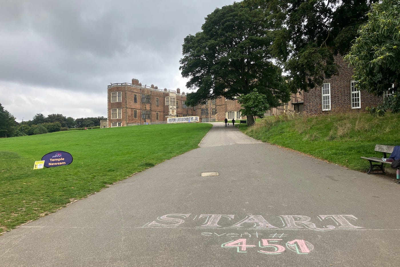 Start line marked in chalk, looking up toward the hall