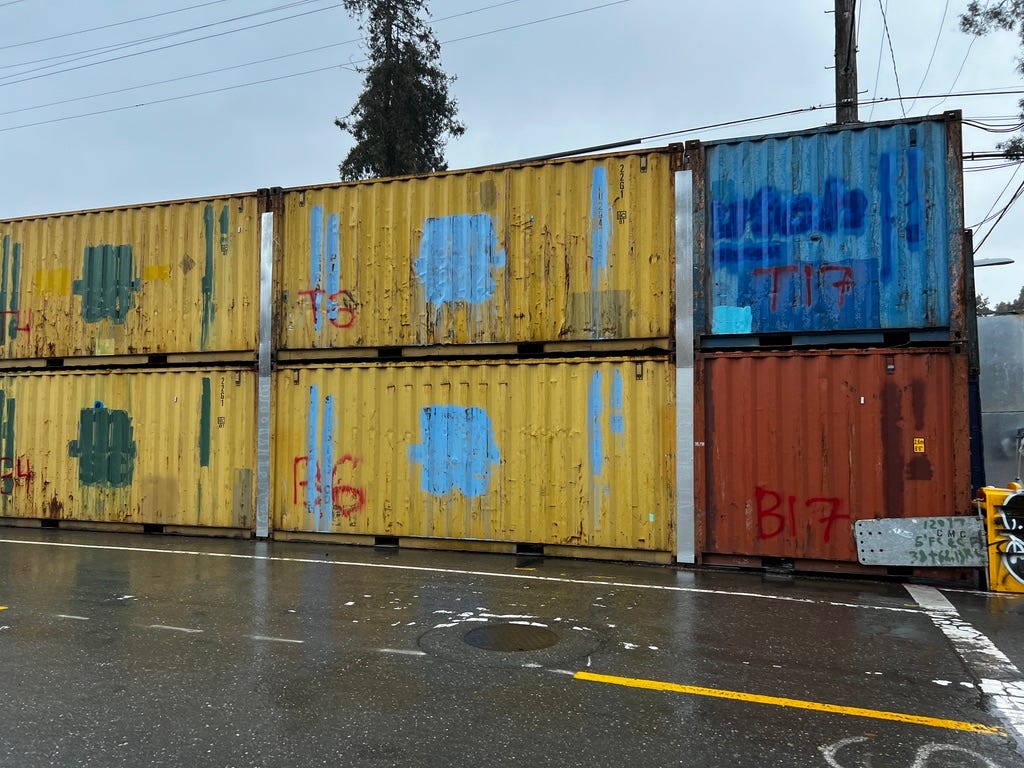 Shipping containers surrounding People's Park, Berkeley.