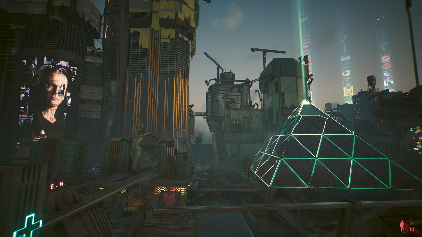 A screenshot of Cyberpunk 2077: Phantom Liberty, showing several buildings of the Dogtown district, such as a massive pyramid and a billboard with Kurt Hansen's face.