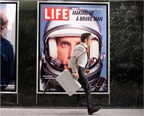 Man running in front of a poster - scene from The Secret Life of Walter Mitty