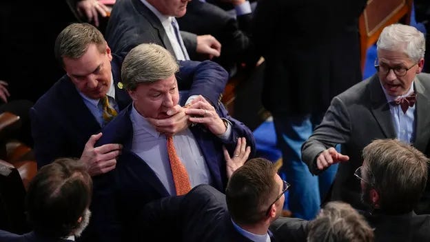Washington , D.C. - January 6: Mike Rogers (R-AL) is restrained after getting into an argument with Matt Gaetz (R-FL) during in the 14th round of voting for speaker in a meeting of the 118th Congress, Friday, January 6, 2023, at the U.S. Capitol in Washington DC. The House reconvened Friday night after adjourning earlier for a fourth day of voting after Rep.-elect Kevin McCarthy failed to earn more than 218 votes on 11 ballots over three days. (Photo by Jabin Botsford/The Washington Post via Getty Images) The Washington Post | The Washington Post | Getty Images