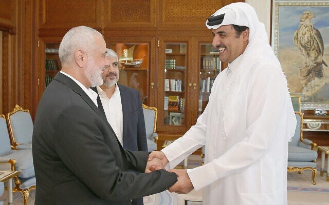 File - Qatari Emir Tamim bin Hamad al-Thani (R), in a meeting with Hamas politburo leader Ismail Haniyeh (L) and official Khaled Mashal in Doha, Qatar, October 17, 2016 (Qatar government handout)