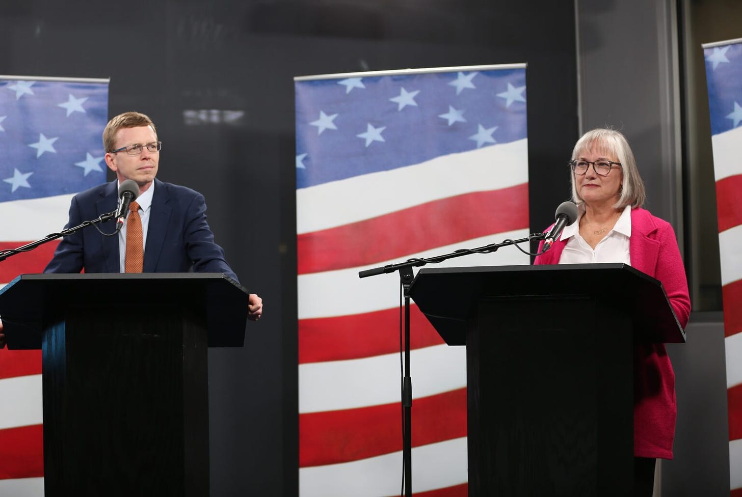 U.S. Rep. Dusty Johnson, R-South Dakota, (left) and Democratic challenger, Sheryl Johnson, face off in a debate on Oct. 15, 2024, in Sioux Falls. (Joshua Haiar/South Dakota Searchlight)