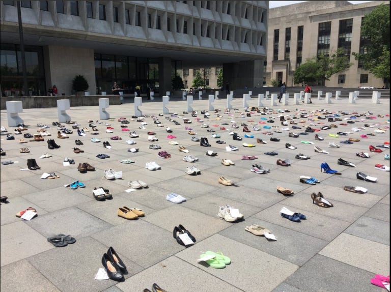 Empty pairs of shoes from first Millions Missing protest in 2016