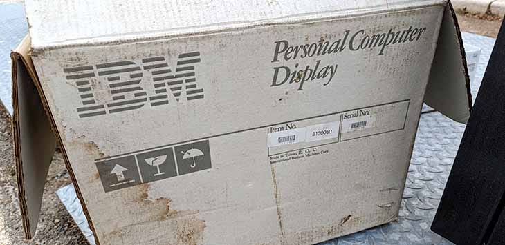 Photo of an old cardboard box that once contained an IBM Personal Computer Display.
