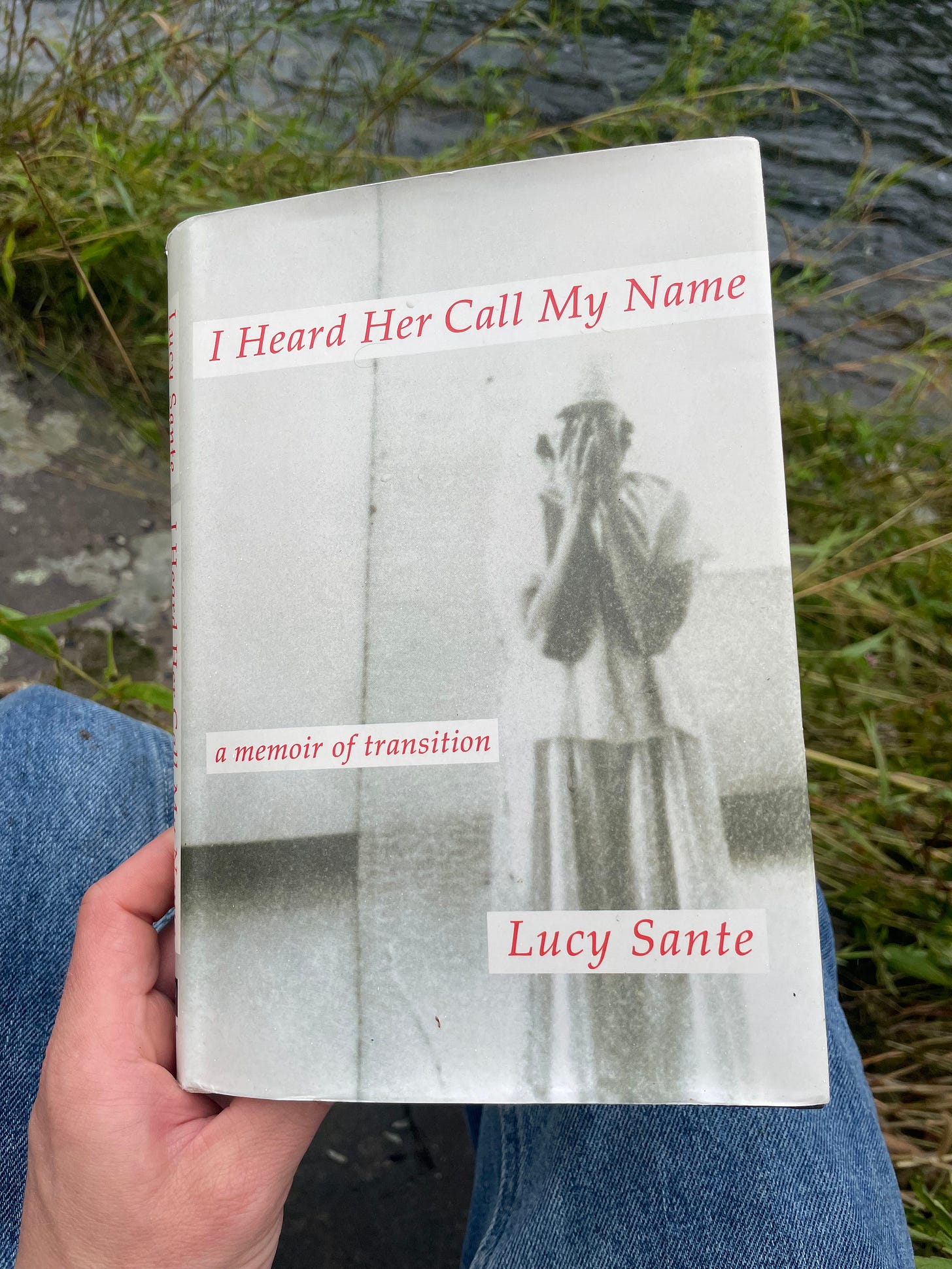 The cover of Lucy Sante's memoir, featuring a woman holding her face in her hands