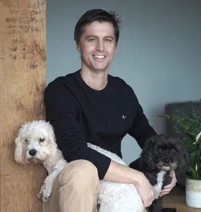 dr sam white with his two dogs