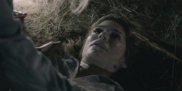 Walker Emily dead in hay stack.