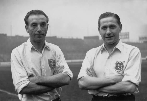 English footballers Stanley Matthews and Stanley Mortensen during a training session at Stamford Bridge, London, before a game against a 'rest of the...